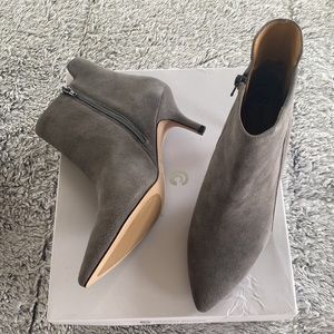 These gray boots have never been worn.